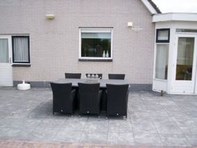 Bestrating achter tuin